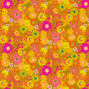 Retro 1970s themed floral wide quilt backing fabric pattern featuring bright pink, yellow, orange, and green flowers, leaves, and abstract eye and moon motifs on an orange background,