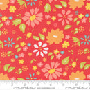 Wide Quilt Back Fabric with a colorful floral pattern on a red background and a ruler for scale at the bottom.