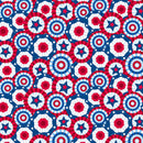 Wide quilt backing fabric with a pattern of red, white, and blue circles and stars on a blue background.