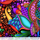 A close-up of a colorful abstract patterned wide quilt back with swirling paisley-like shapes, dots, and curved bands in bright blue, pink, purple, orange, green, yellow, red, and black. A small ruler-like scale appears along the bottom edge.