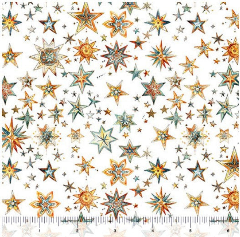 Fabric pattern of colorful stars with a ruler at the bottom for scale on a white background.