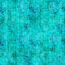 Wide quilt back fabric with a textured teal print with floral patterns.