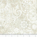 Ecru colored wide quilt backing fabric with a bohemian abstract design with a ruler at the bottom to show scale.