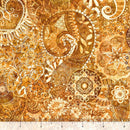 Carmel colored wide quilt backing fabric with a bohemian abstract design with a ruler at the bottom to show scale.