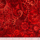 Red wide quilt backing fabric with a bohemian abstract design with a ruler at the bottom to show scale.