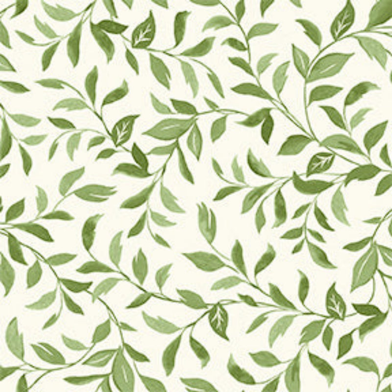 Wide quilt backing fabric with a pattern of green vines with leaves on a cream background.