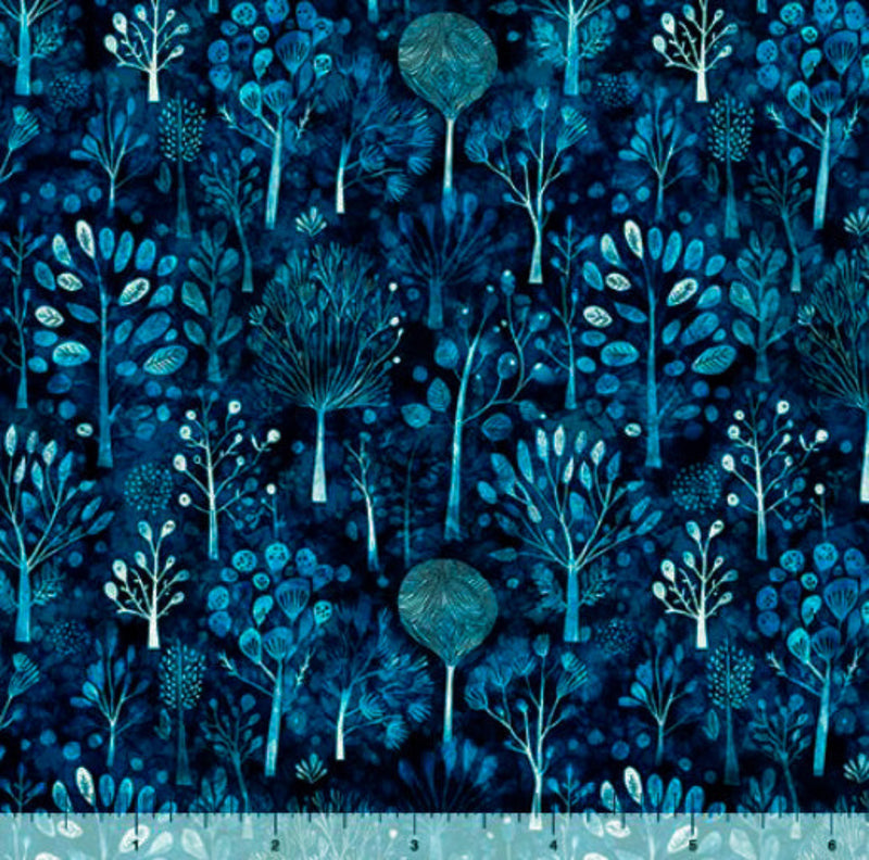 Wide quilt backing fabric with a pattern of blue trees and foliage on a dark blue background with a ruler at the bottom for scale.