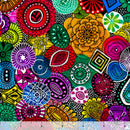 Colorful patterned fabric with a ruler at the bottom