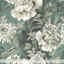 Large floral patterned wide quilt backing fabric with white flowers and green leaves on a soft green background, featuring a ruler at the bottom to show scale.