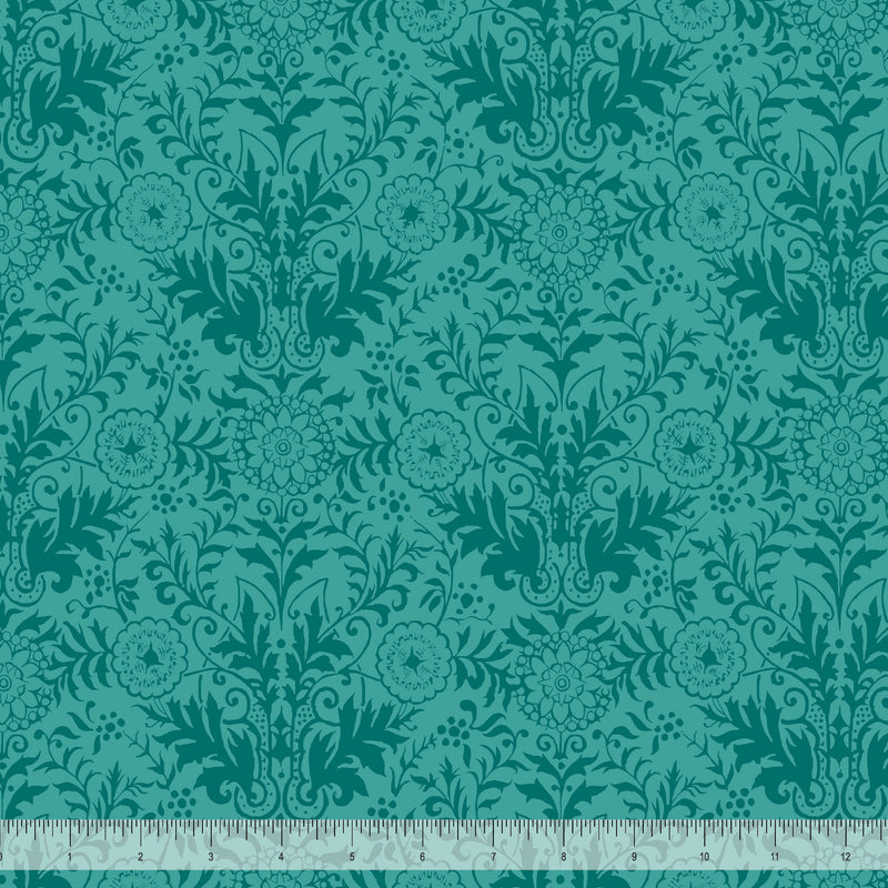 Wide quilt backing fabric in a teal floral damask pattern with a ruler at the bottom for scale.