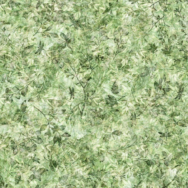 118" wide quilt backing fabric with a fabric with a leaf print design with dragonflies, featuring various shades of green and a yellowish tone, reminiscent of leaves and plant textures.