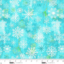 Pattern of white snowflakes on a turquoise textured background with a ruler at the bottom to show scale.