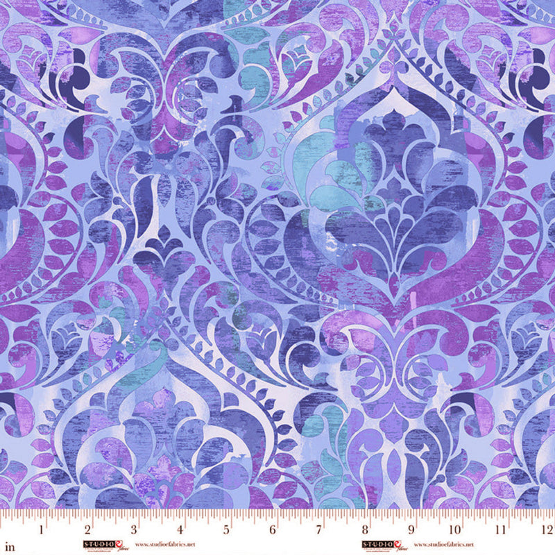 Wide quilt back fabric with a damask print in purples and blues.