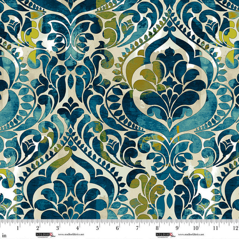 Wide quilt back fabric with a damask print in teals, chartreuse greens, beige and white.