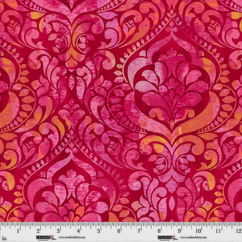 Wide quilt back fabric with a damask print in pink and orange on a magenta background.