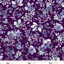 Floral patterned wide quilt backing fabric  with  purple,, blue and white flowers on a purple background with a ruler at the bottom to show scale.