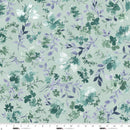 Floral patterned wide quilt backing fabric  with green and white flowers on a dusty green background with a ruler at the bottom to show scale.