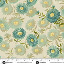 Wide quilt backing fabric with a pattern of teal flowers with green leaves on a beige background, with a ruler at the bottom to show scale.