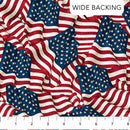 Wide quilt backing fabric with a packed American flag design and a ruler at the bottom to show scale.