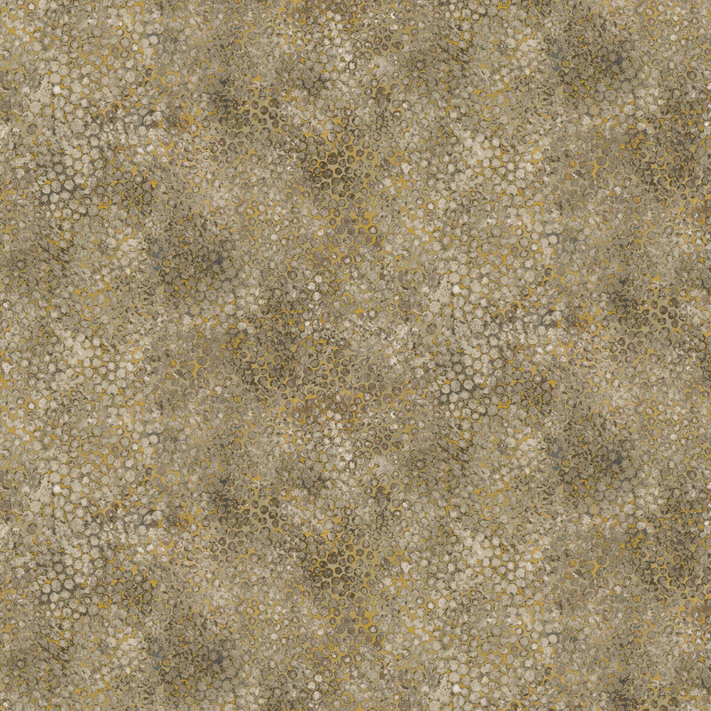 Wide quilt backing fabric with a tone on tone, tiny circle pattern with tan, brown, and gold hues.