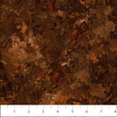 Wide quilt backing fabric with tone on tone brown textured pattern with a ruler at the bottom to show scale.