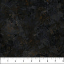 Wide quilt backing fabric with tone on tone black, gray and brown textured pattern with a ruler at the bottom for scale.