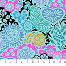 Colorful floral and abstract patterned wide quilt backing fabric with a ruler at the bottom for scale.