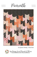 Quilt pattern with cat designs in various colors on a white background, featuring the title 'Purrville'.
