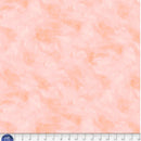Peach wide quilt backing fabric with a  tone on tone textured look.
