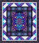 Colorful quilt with a central mandala design and geometric patterns in blues, purples, and golds with a white background and a multicolored border.