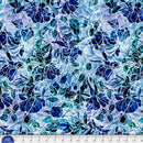 Blue and teal floral patterned wide quilt backing fabric with a ruler at the bottom to show scale.