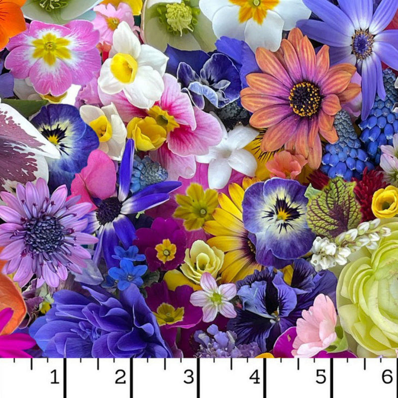 Wide quilt backing fabric with a multi colored packed floral digital image print with a ruler at the bottom to show scale.