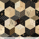 Wide quilt back with a repeating geometric quilt pattern made of hexagonal blocks forming stars in beige, cream, black, and brown, with floral and striped fabric designs shown with a ruler at the bottom indicating scale.