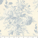 Floral pattern with blue flowers and leaves on an ivory background with a ruler at the bottom for scale.