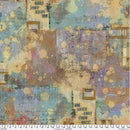 Wide quilt backing fabric with an abstract splotched paint design in tan, brown, blue, and purple with geometric markings in black and the words "one layer away from magic" scattered randomly with a ruler at the bottom for scale.