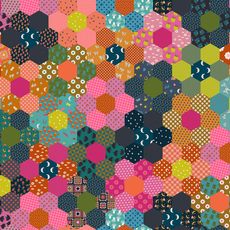 Wide quilt backing fabric with a colorful hexagonal pattern with various shapes and colors.