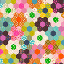 Wide quilt backing fabric with a colorful hexagonal pattern with various shapes and colors.