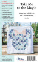 Quilt with mouse design in front of a castle, featuring text about fabric requirements and a quote.