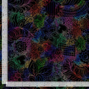 Wide quilt backing fabric with an allover multicolored doodle looking design on a black background with rulers on two sides to show scale.