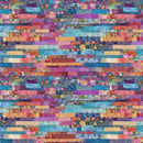 Wide quilt backing fabric with a multicolored patchwork strip quilt design.