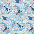 Wide quilt backing fabric with a pattern of orcas, rays, sharks, narwhals, fish, turtles and flowers on a blue background.