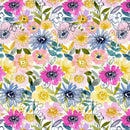 Wide quilt backing fabric with a pattern of colorful flowers in pink, lavender, yellow and blue with green, yellow and blue leaves on a white background.