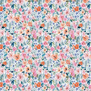 Wide quilt backing fabric with a floral pattern with pink, orange, blue and green flowers on a white background.