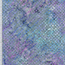 Cotton batik wide quilt backing fabric with a pattern of small, oval shapes in purple, blue, and gray.